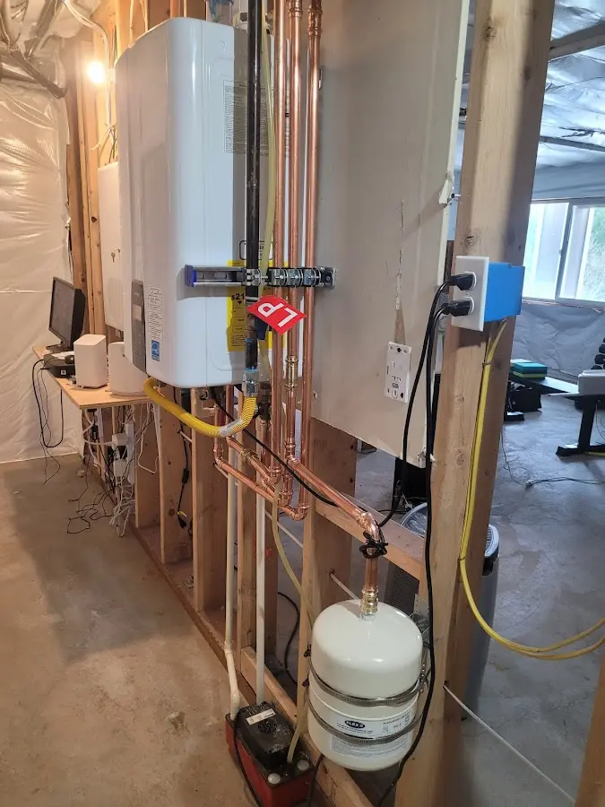 Licensed plumber repairing a kitchen sink in Union